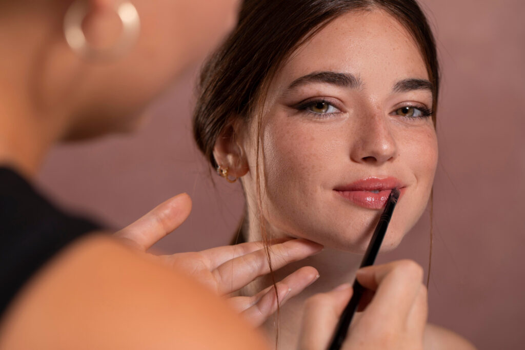 Close-up highlighting makeup techniques to Make Lips Look Bigger.